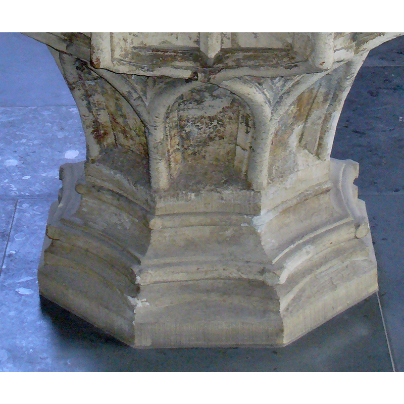 on the octagonal stem of the restored late-medieval font