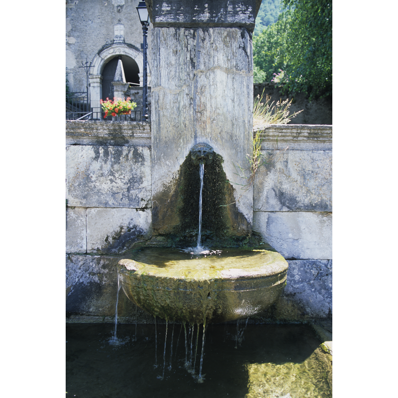 a fountain outside the church