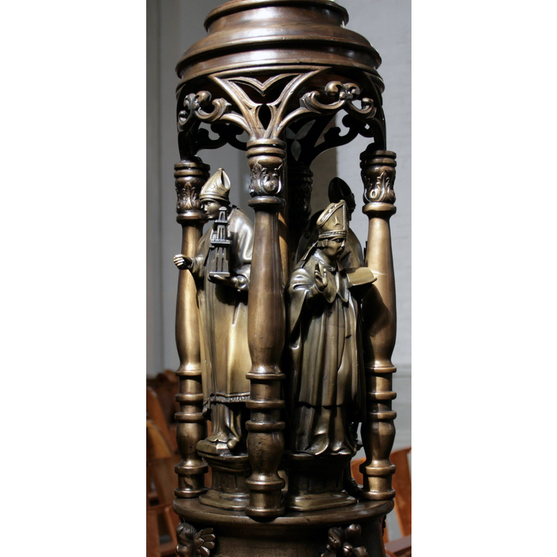 three of them were bishop's mitres; one is a young figure without distinctive garb