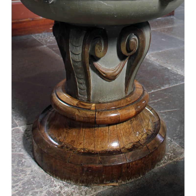 the painted stone stem and the varnishes wooden lower base
