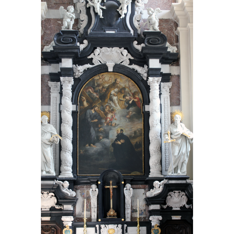 Text on a plaque posted by this altar: "Baroque altar executed in 1660 by the Antwerp sculptor Peter Verbrugghe. Reredos painting: The Vision of St. Ignatius on his way to Rome, by Jan Cesiers."