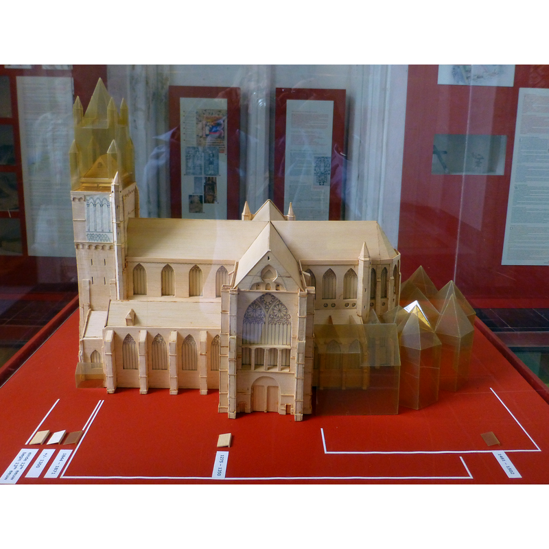 a maquette showing the three different periods of the building