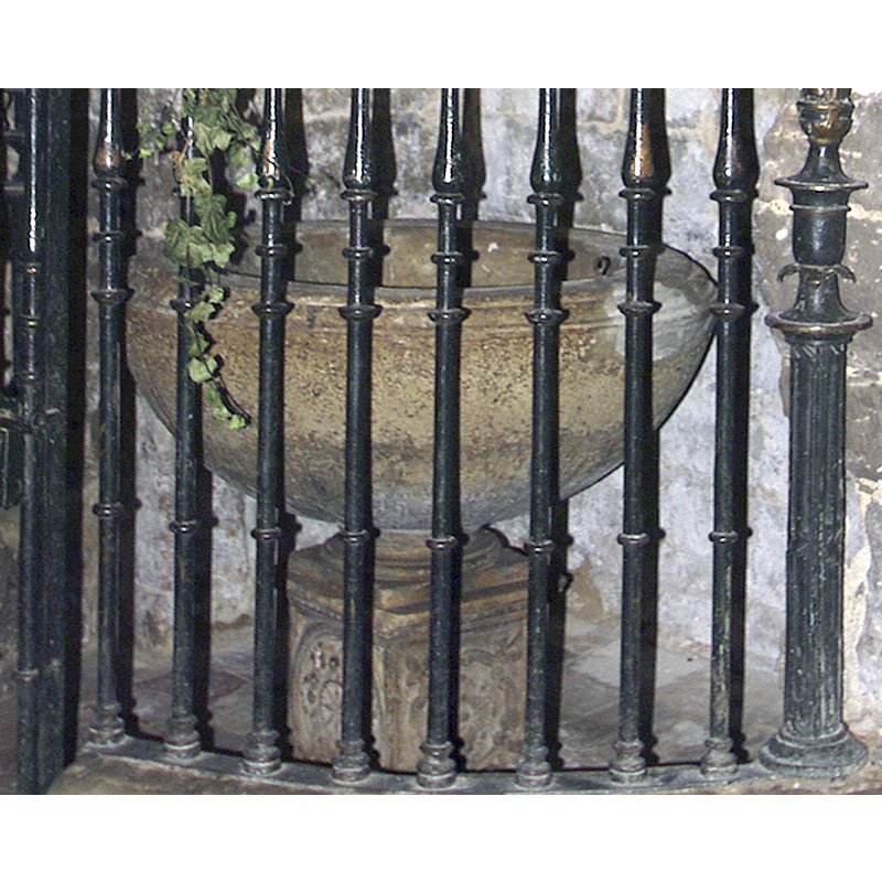 two sides of the square pedestal base are visible here