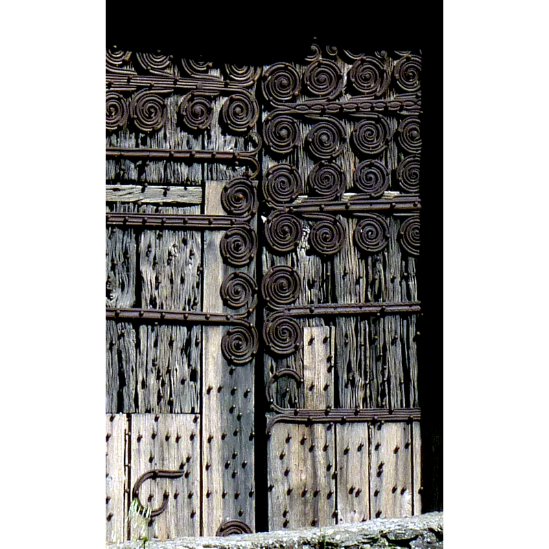 noteworthy original ironwork on the west door