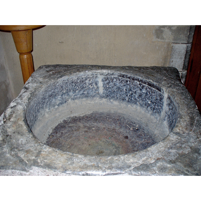 the well-worn lead lining; the centre drain hole appears blocked now