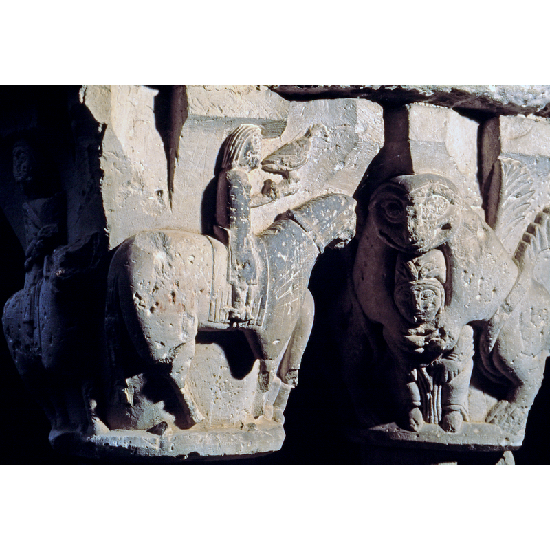 capital on the northeast corner of the cloister; hunting with falcon scene... the next capital to the right has a rampant (?) lion that may be part of the hunt scene