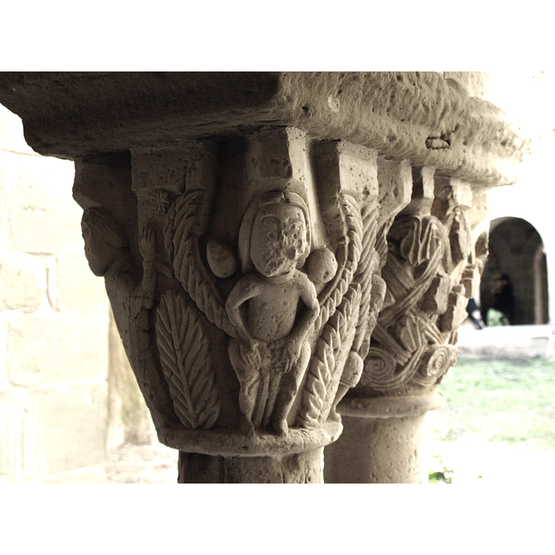 inner capital on the north side; a naked person covering his parts; in the adjacent face to the left is a cleric in orante position