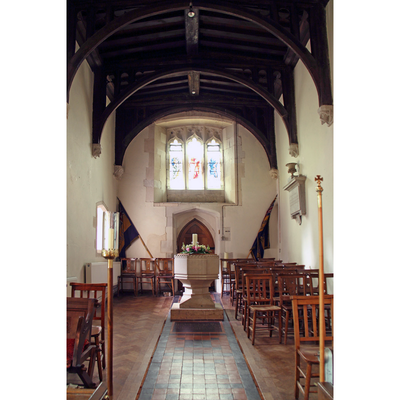 the modern font at the west end of the nave
