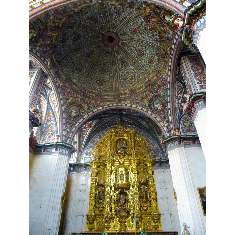 Capilla de Santa Tecla, at the west end of the north aisle, the baptismal chapel that houses the baptismal font