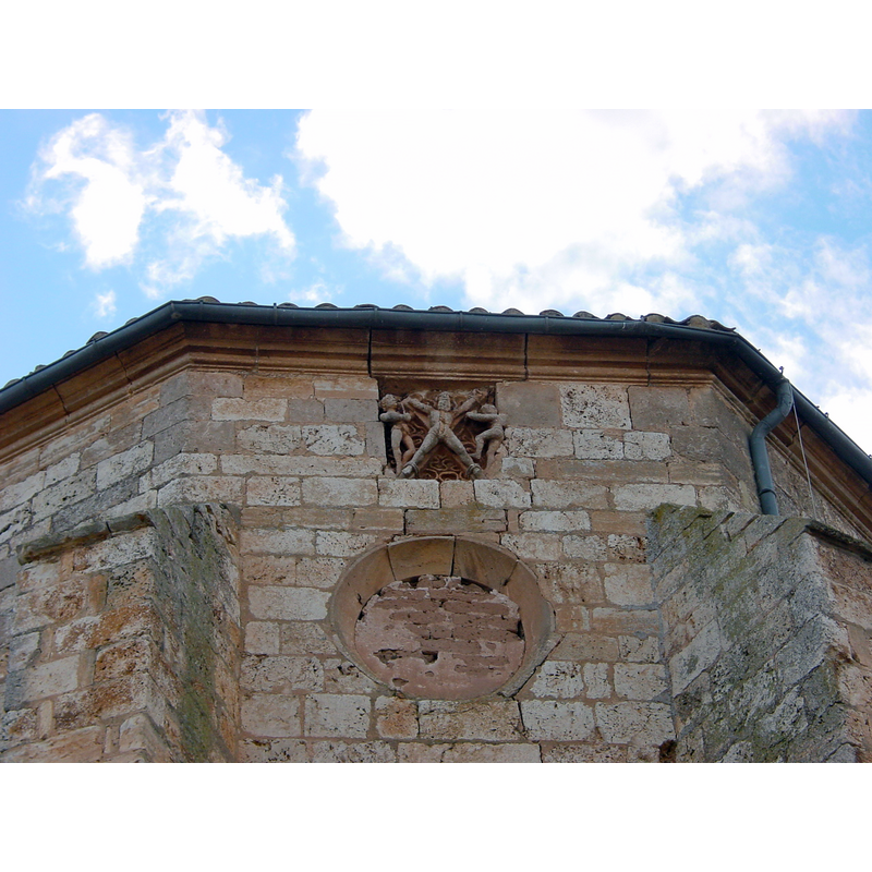 the martyrdom of Andrew at the top; below is the blocked rose window, the glass itself now lost