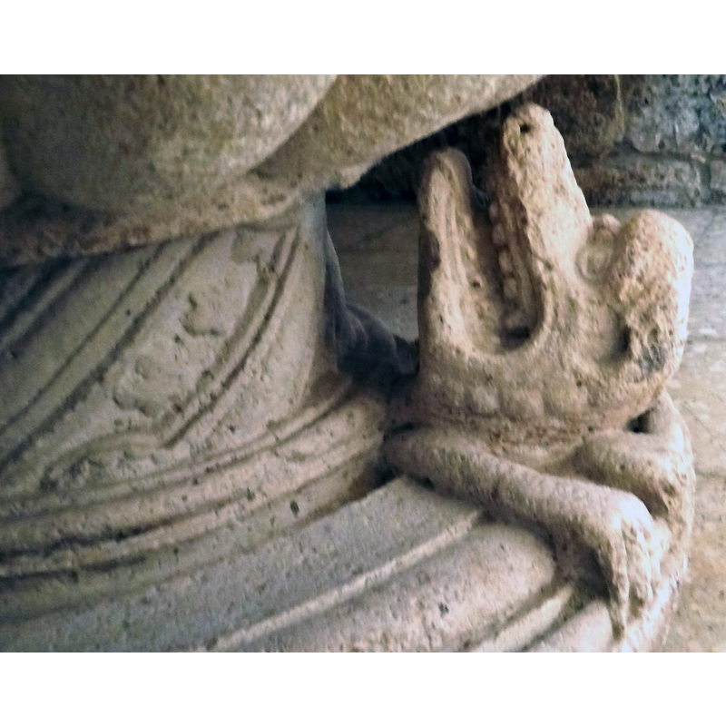 one of the lion protomes