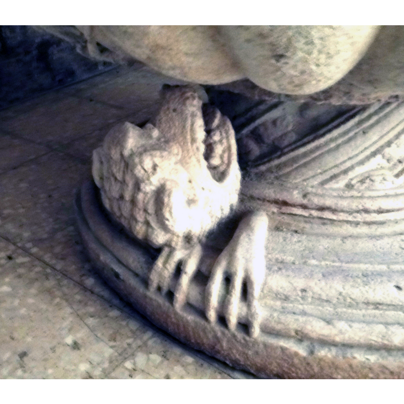 one of the lion protomes