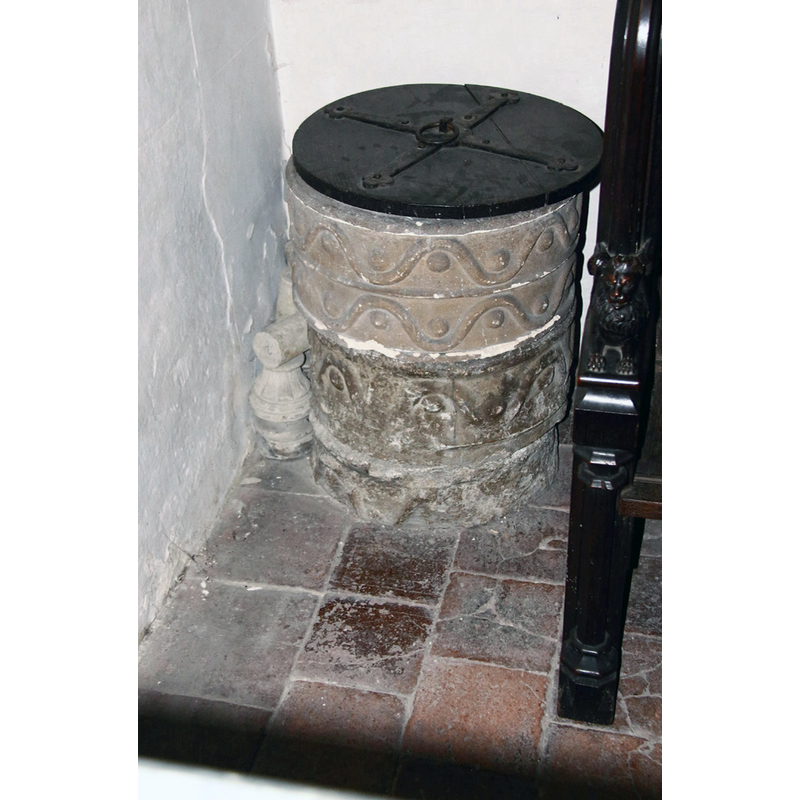 the disused redundant old font, said to be a 19thC composite using the lower part of a 12thC font