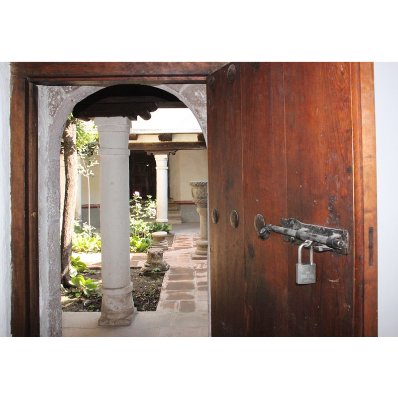 with a cloister font that was made much lijke the font and stoups of the time and place