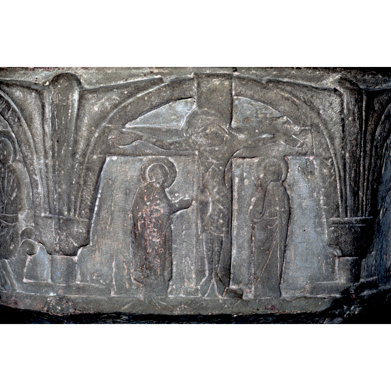 on the southwest side of the basin -- Christ on the cross. Arms out, head lying to his right shoulder, legs together and feet apart. Figure to the right, right hand raised to his face (St.John) maybe resting his head on it. His left hand inside the mantel.Full frontal and haloed. Left figure (Virgin) in profile and haloed. Right hand raised up 45* angle. Cross extends beyond the frame of the image.