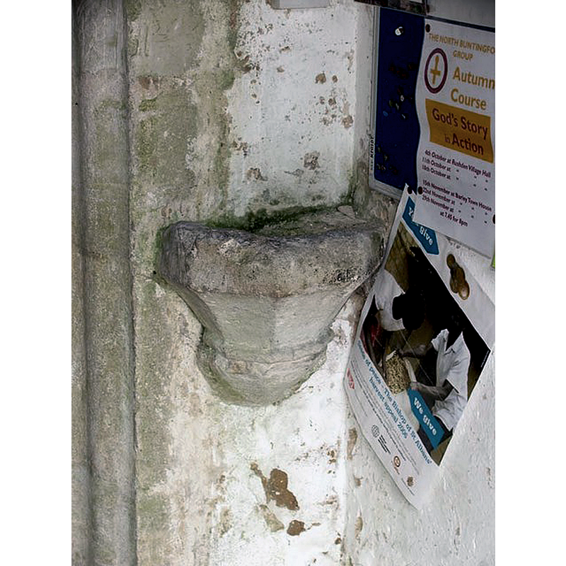 wall-mounted on the northeast pillar of the south porch
