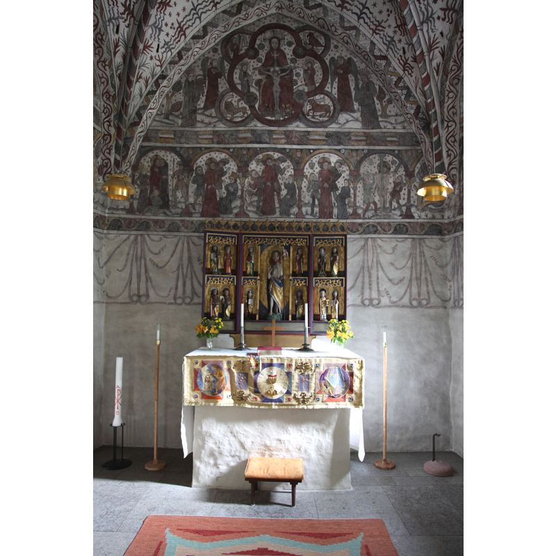 with the painted apse in the background
