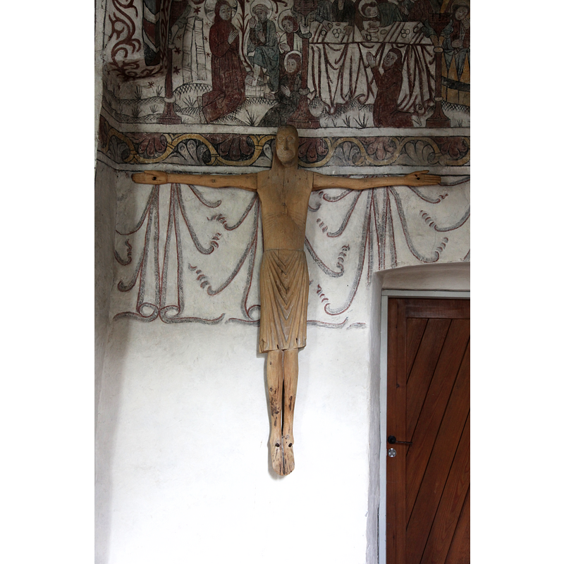 moved to the upper corner of the sacristy doorway, north wall of the chancel