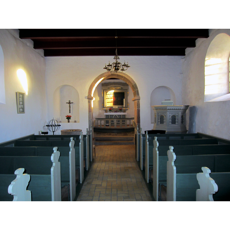 the top of the font is visible at the far [east] end of the nave, left [north] side
