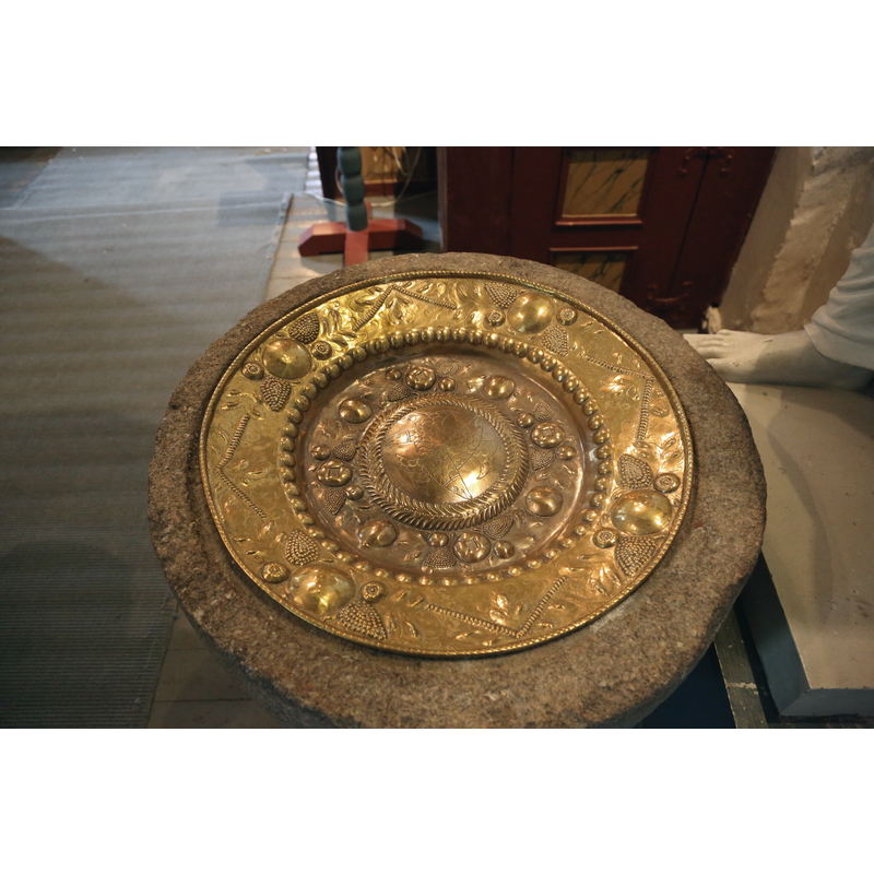 the baptismal dish in use