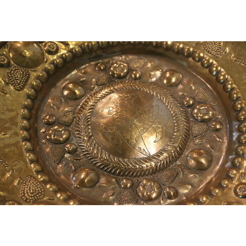 the baptismal dish in use