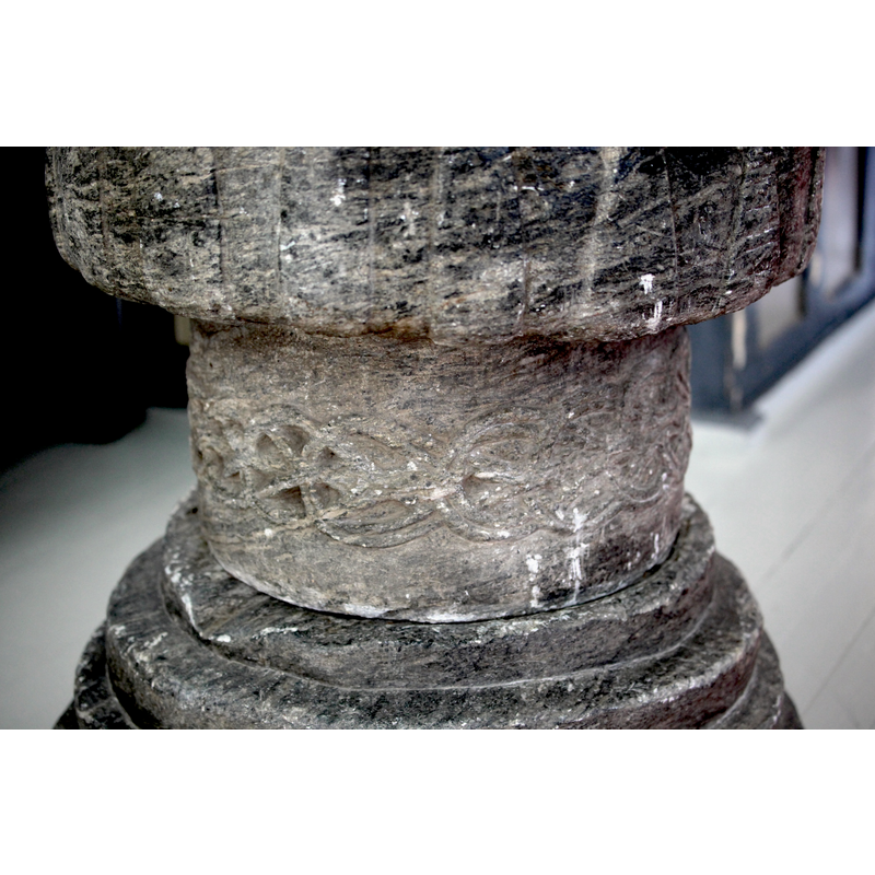 on the stem of the base