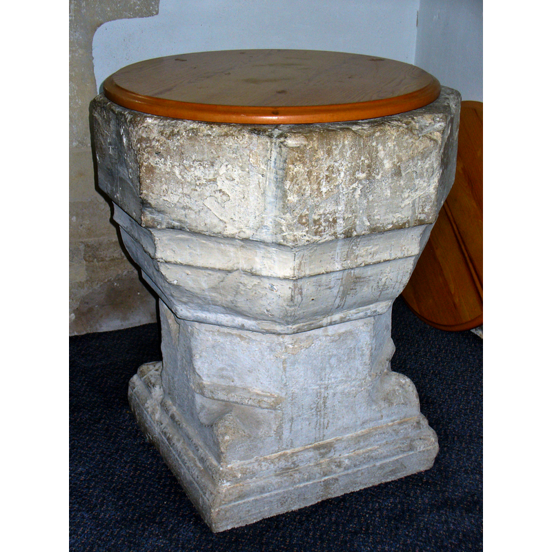 the 14thC (?) font and its modern cover