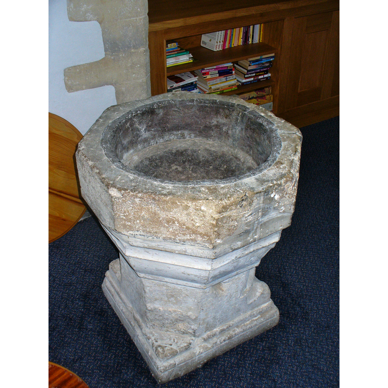 the 14thC (?) font -- notice the old lead lining