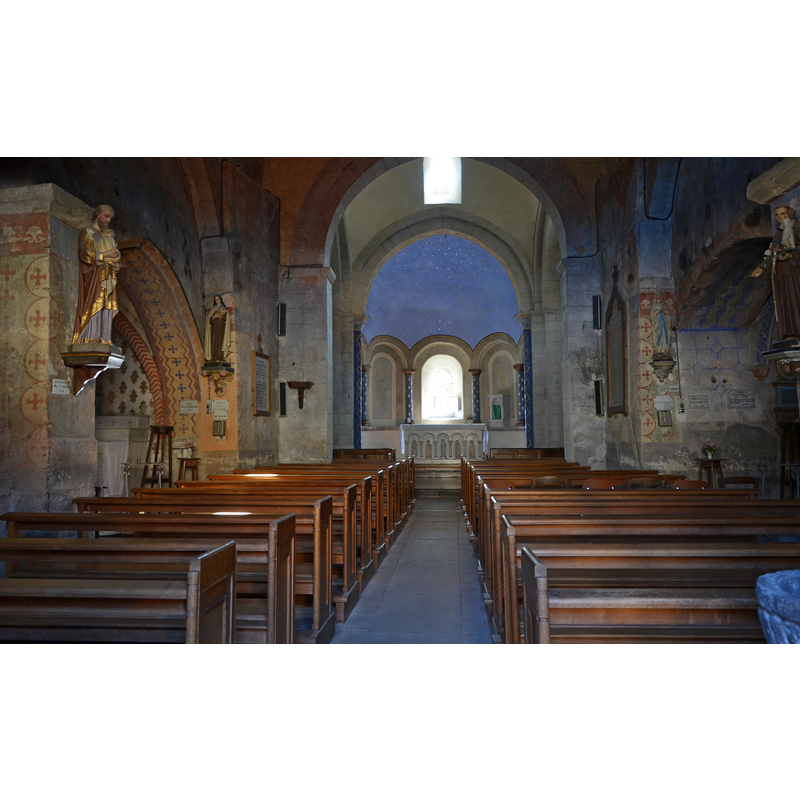 a partial view of the basin of the font in the foreground, right corner