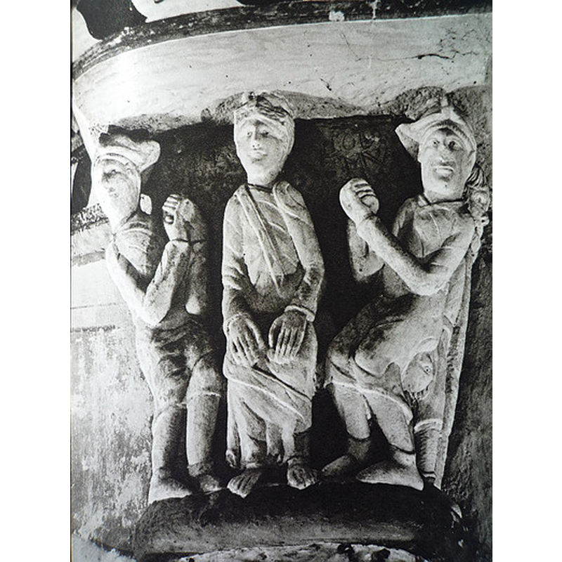 one of a series of capitals on the Childhood of Christ cycle in this church: Finding in the Temple [aka Christ Among the Doctors] (Luke 2:42-52) [NB: the names 'Gamaliel" and Nicodemus' carved on the stone identify the two doctors] -- notice the hands