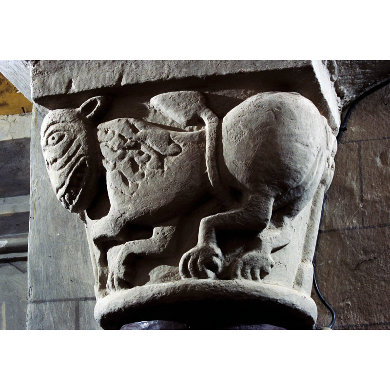 a medieval lion similar to those found on several fonts of northeast Jutland, in Denmark