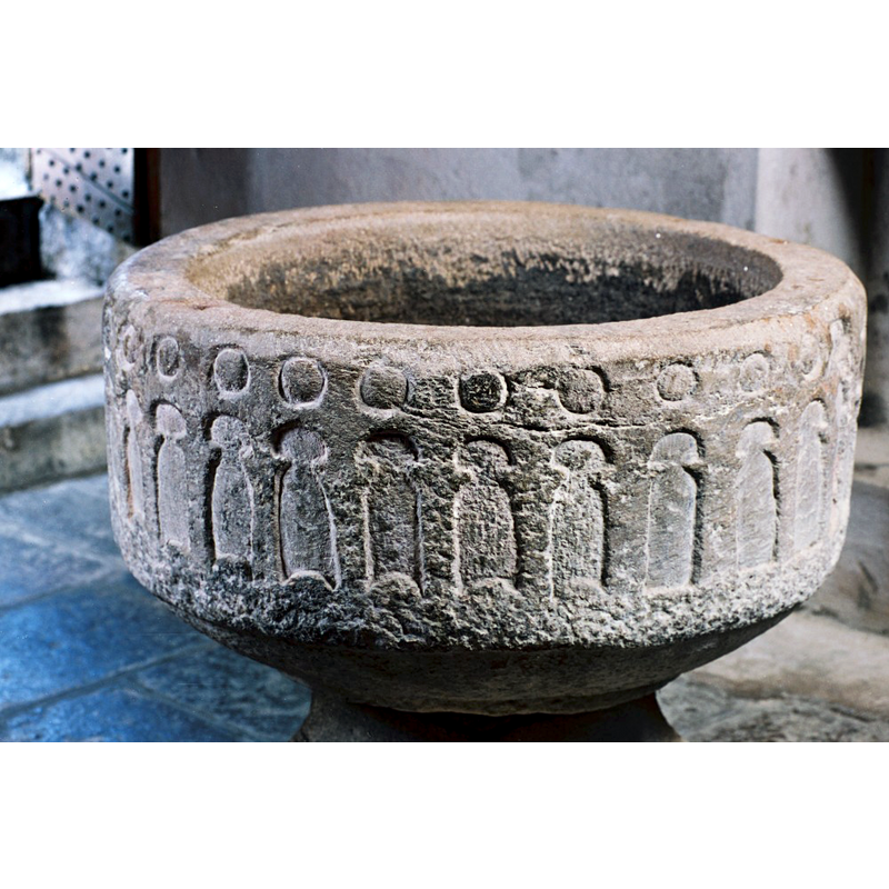 on the basin sides, under the row of circles