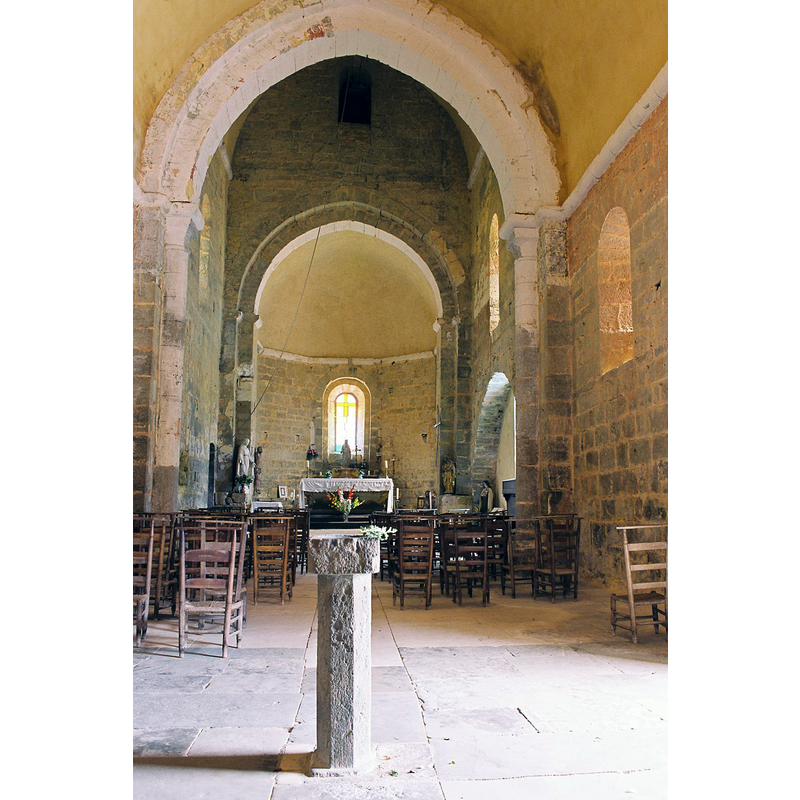 the slender stoup in the foreground appears modern