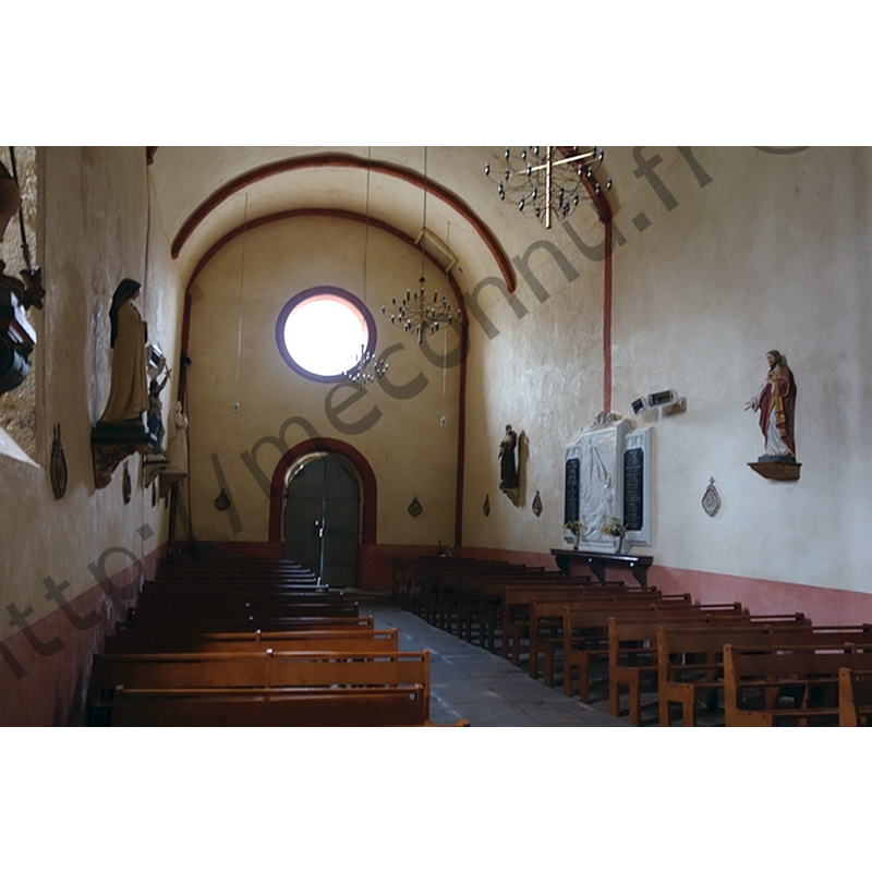 the font is located at the far [west] end, hidden behind the right [north] bank of benches