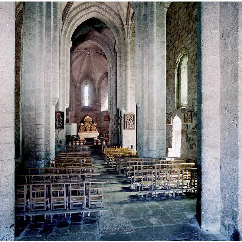 a stoup is visible on the east side of the south entranceway