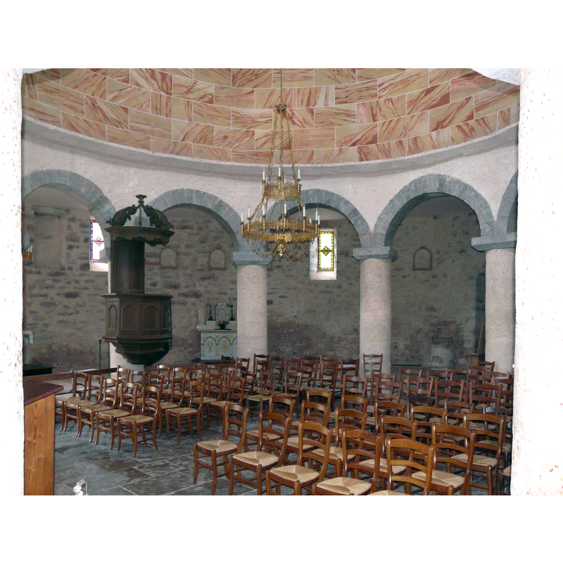 what is the object partly embedded in the west wall by the west entranceway? a stoup? a font?