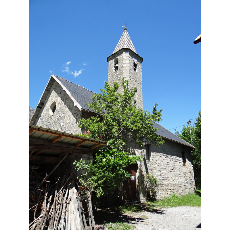 unfortunately the farm buildings are very close to the church and impede a decent view of the whole