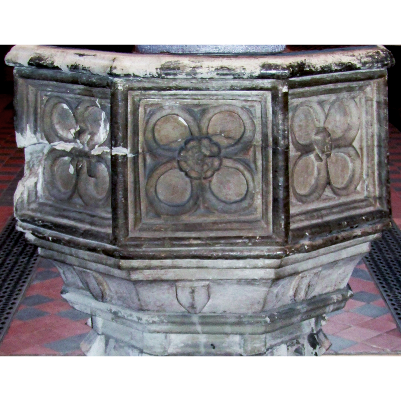 on the east side of the basin; the motifs or symbols on the northeast and southeast are not identified -- notice the damage on the southeast side of the basin, with a crack line showing also across the east panel