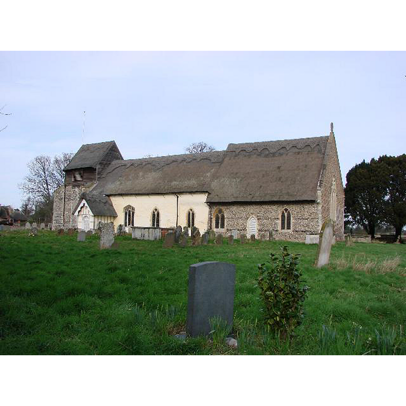 Source caption: "Uggeshall church would not look out of place in a Saxon village. There once was a tower but it fell quarter of a millennium ago. The whole building is thatched, tower and porch, nave and chancel. The south door is in the Norman style and may have replaced an original. The church was virtually rebuilt in the 14th c."