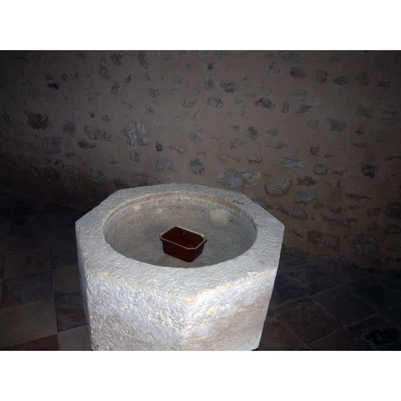 with a partial view of the basin interior; the centre drain hole is cemented over now