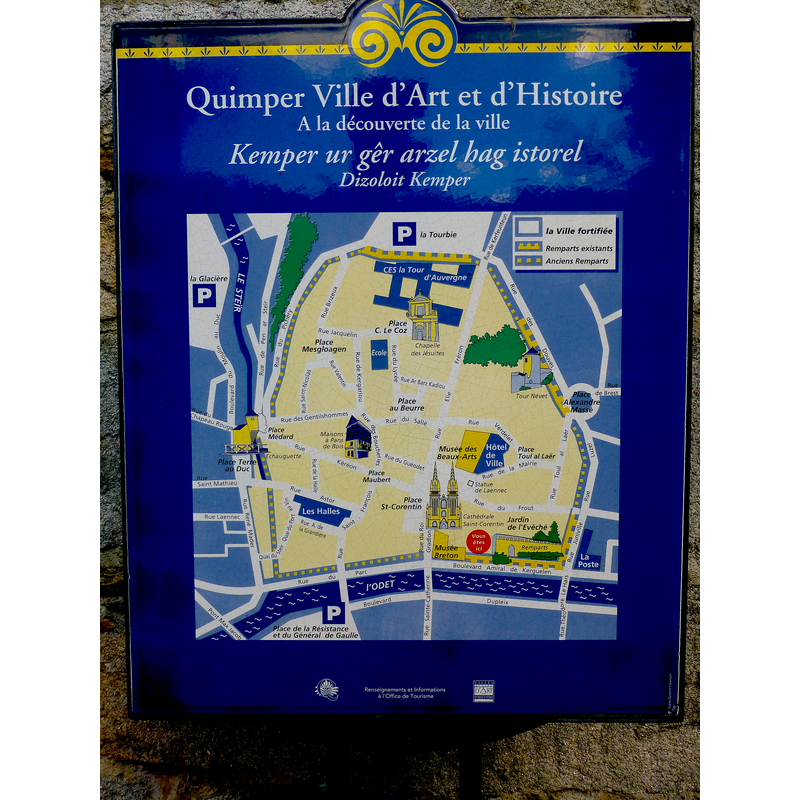 the location of the cathedral in the town centre, just north of the river
