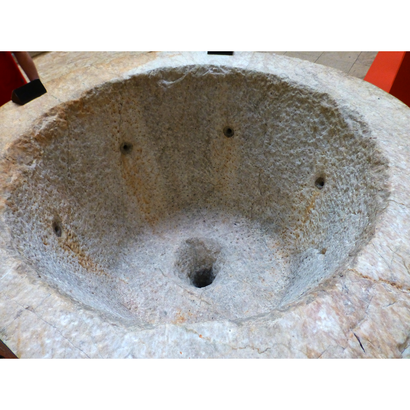displayed in the Musée national du Moyen Âge (6 Place Paul Painlevé, 75005 Paris, France) and identified as a late-12thC cloister font from the Prieuré Saint-Michel de Grandmont