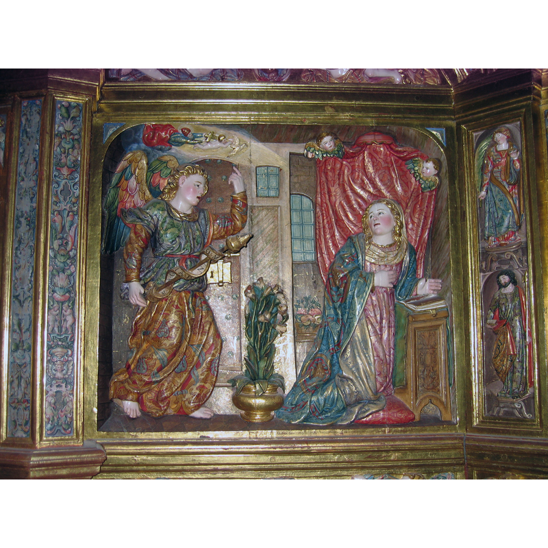 Source caption: "Escena de la anunciación en el retablo mayor de la iglesia de San Miguel de Mahamud"