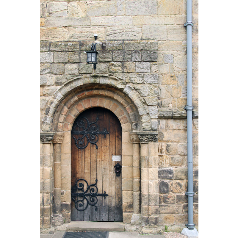 Source caption: "Melbourne Parish Church side door. The small door with a Norman Arch"
