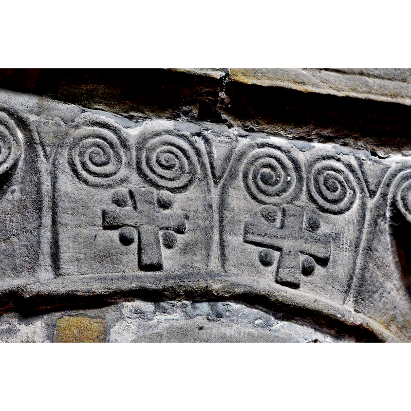 Source caption: "Melbourne Parish Church, Norman capitals: The cross with four roundels motif. Its meaning has never been explained,"