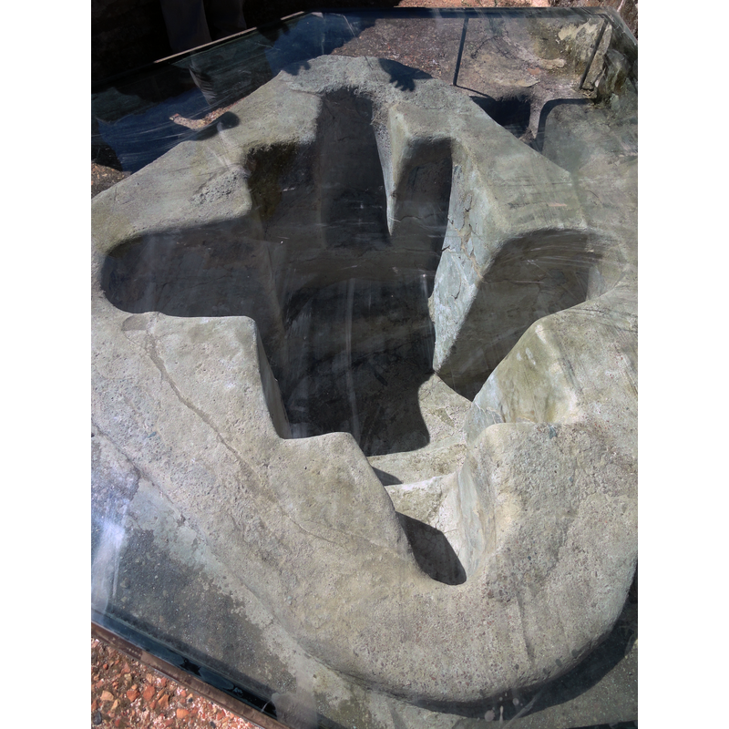 in August 2014 -- the reflections and shadows are from the plate of transparent glass (?) that covers the whole font