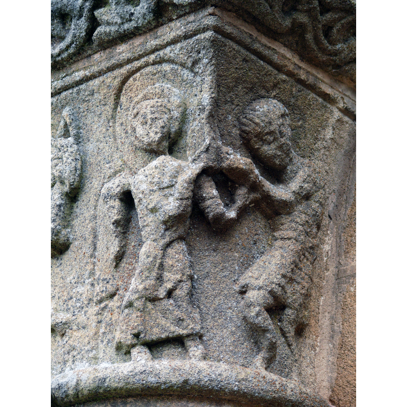 haloed figure on the left wering a cape (?); an indigent on the right [St. Martin sharing his cape with poor man?]