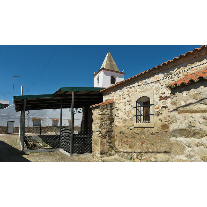 the excavated site of the ancient Visigothic (?) basilica (on the left) is adjacent to the 15thC church (on the right)