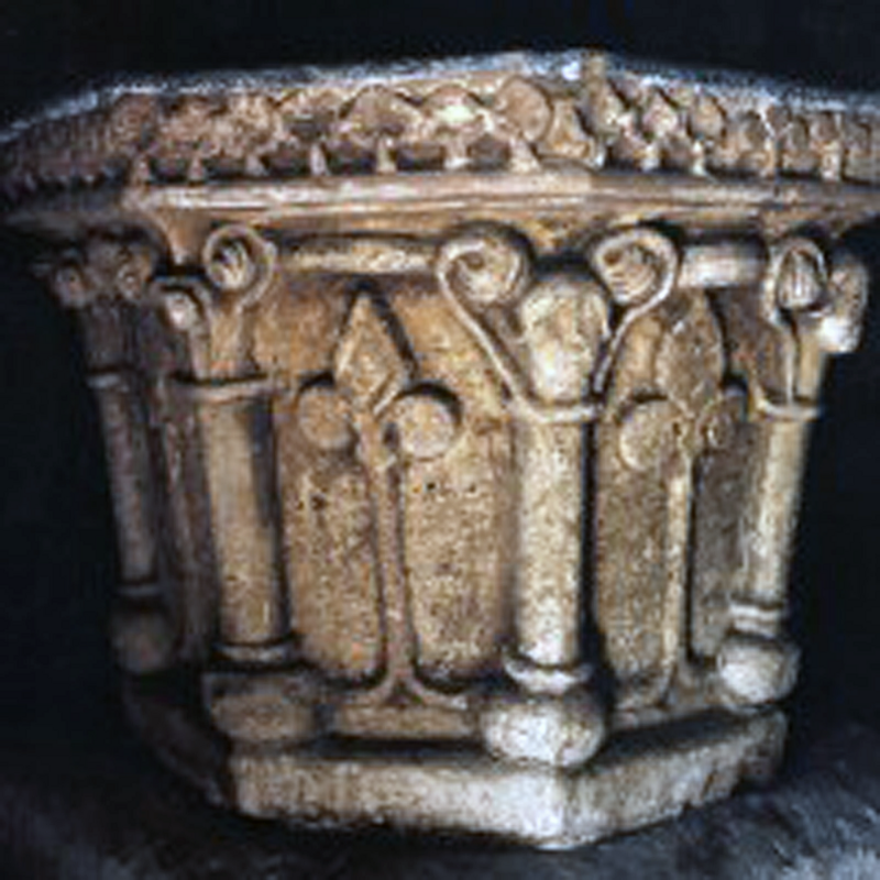 the arch-heads are rather unique, formed by linking vegetal motifs; some of the capitals on the columns are human heads