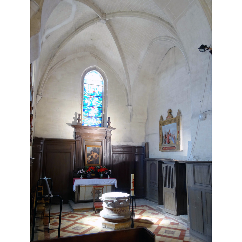 at the west end of the south aisle